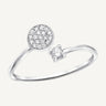 Silver ring with cubic zirconia accents on a white background