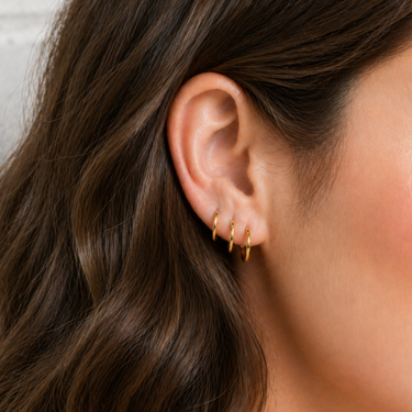 Plated Chaos Model Wearing 24ct Gold Plated 925 Sterling Silver Core Energy Huggie Hoops