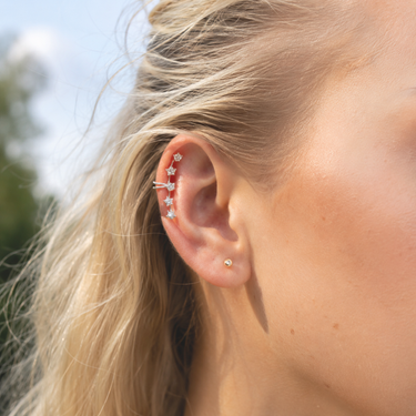 Plated Chaos Model Wearing 925 Sterling Silver CZ Cosmic Obsession Ear Cuff